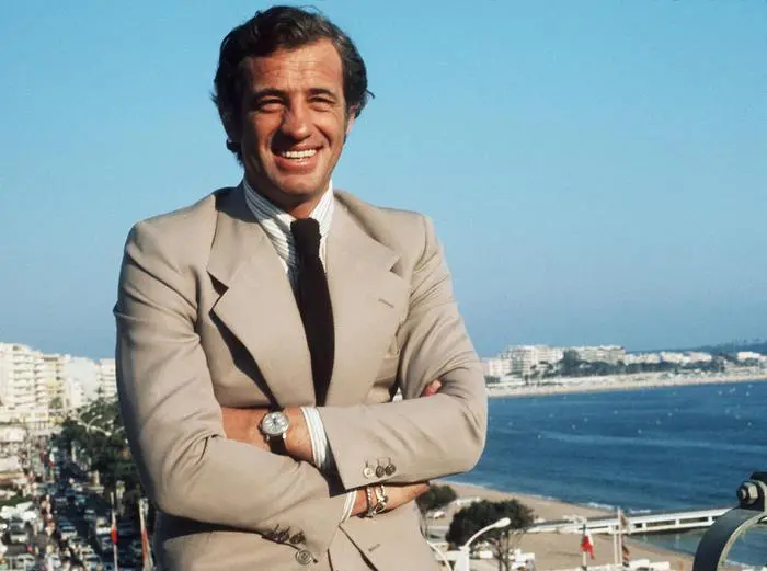(FILES) In this file photo taken in May 1974 Jean-Paul Belmondo, one of France's biggest screen stars and a symbol of 1960s New Wave cinema, smiles during Cannes Film Festival. - French actor Jean-Paul Belmondo has died at the age of 88, it was announced on September 6, 2021. (Photo by - / AFP)