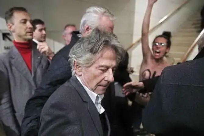 Polanski contestato da un'esponente delle Femen a Parigi (Archivio L'Unione Sarda)