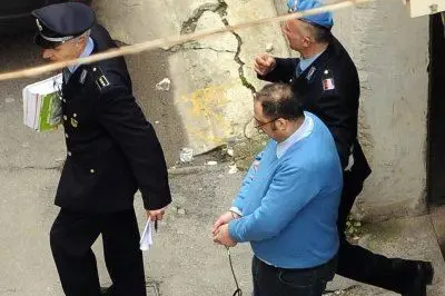 Danilo Restivo scortato dagli agenti della polizia penitenziaria