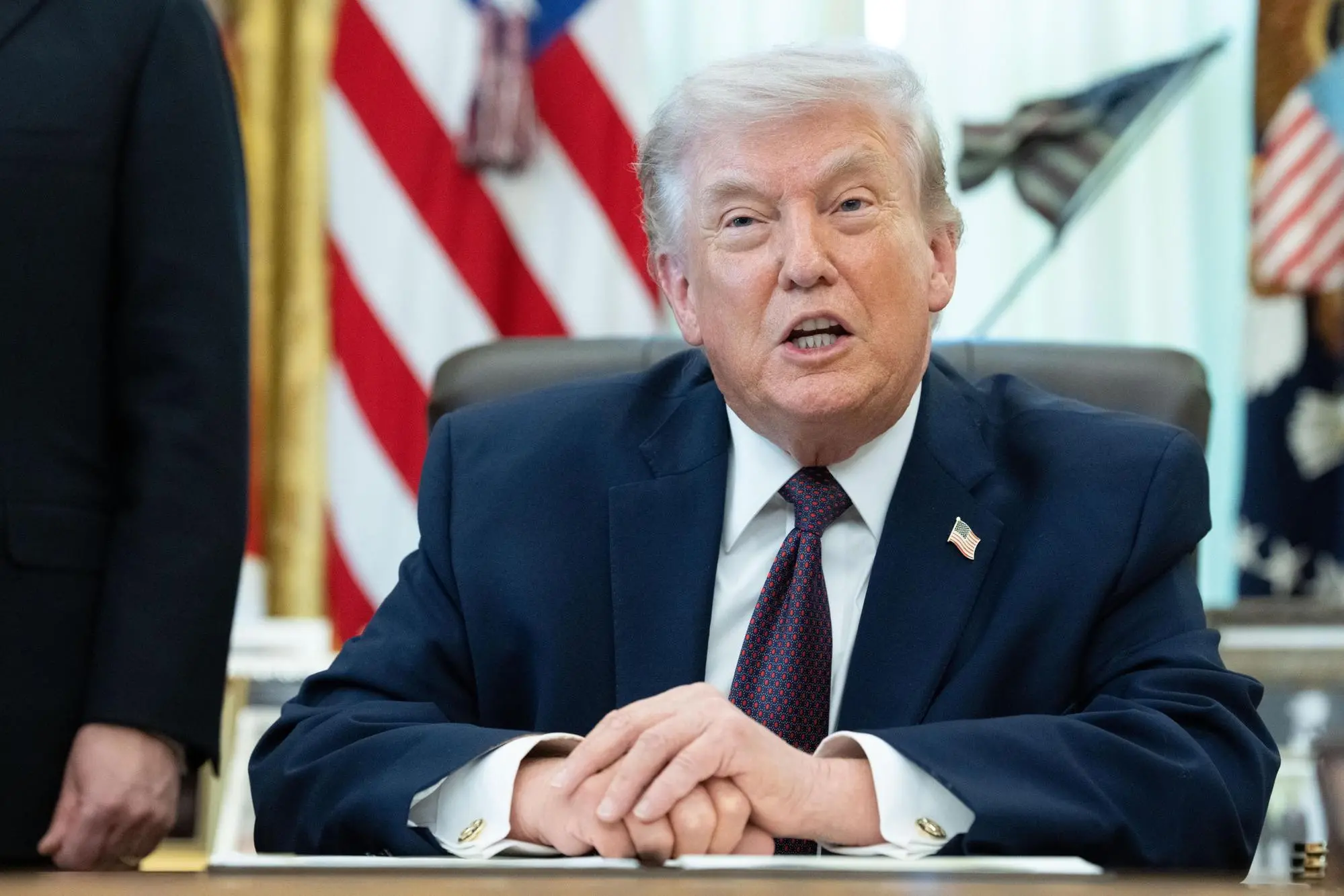 epa12863098 US President Donald J Trump gives remarks during an executive order signing event in the Oval Office of the White House in Washington, DC, USA, 31 March 2026. The order directs the federal government, through the US Postal Service, to provide states with voter eligibility data. EPA/AARON SCHWARTZ / POOL