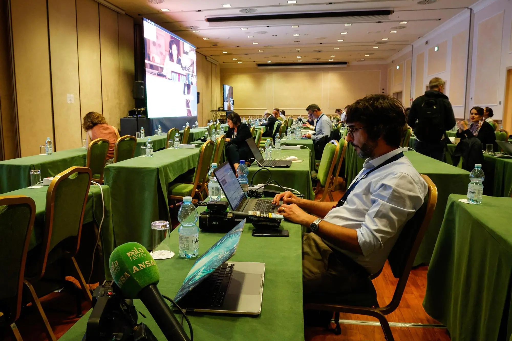 Members of the media wait for the outcome of the European Parliament election inside headquarters of the Brothers of Italy (Fratelli d'Italia), in Rome, Italy, 9 June 2024. ANSA/GIUSEPPE LAMI