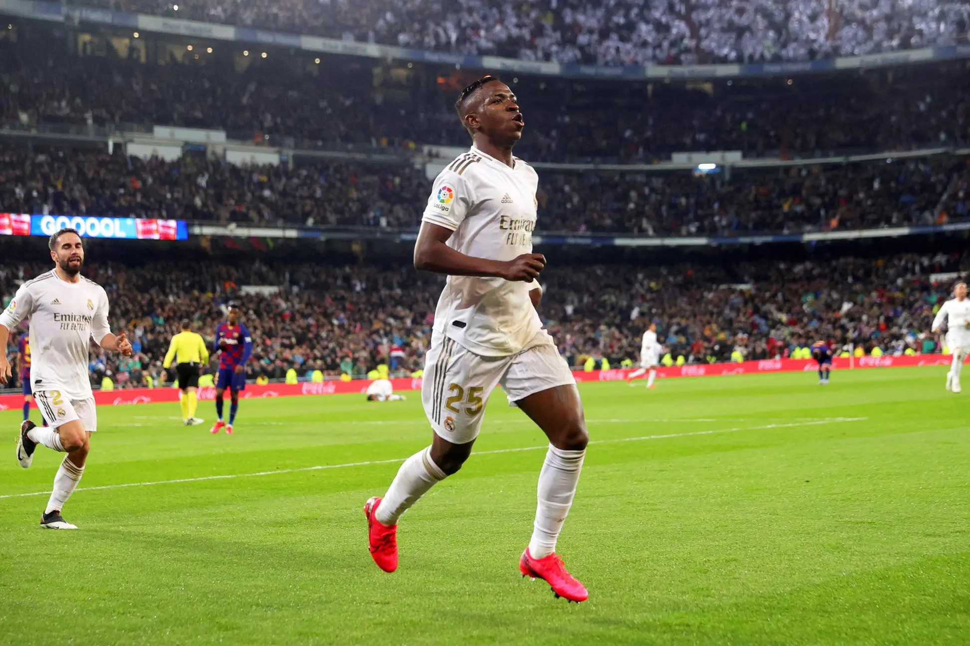 epa08263311 Real Madrid's Vinicius Junior celebrates after scoring the 1-0 lead during the Spanish La Liga soccer match between Real Madrid and FC Barcelona, traditionally known as 'El Clasico', at Santiago Bernabeu stadium in Madrid, Spain, 01 March 2020. EPA/JUANJO MARTIN