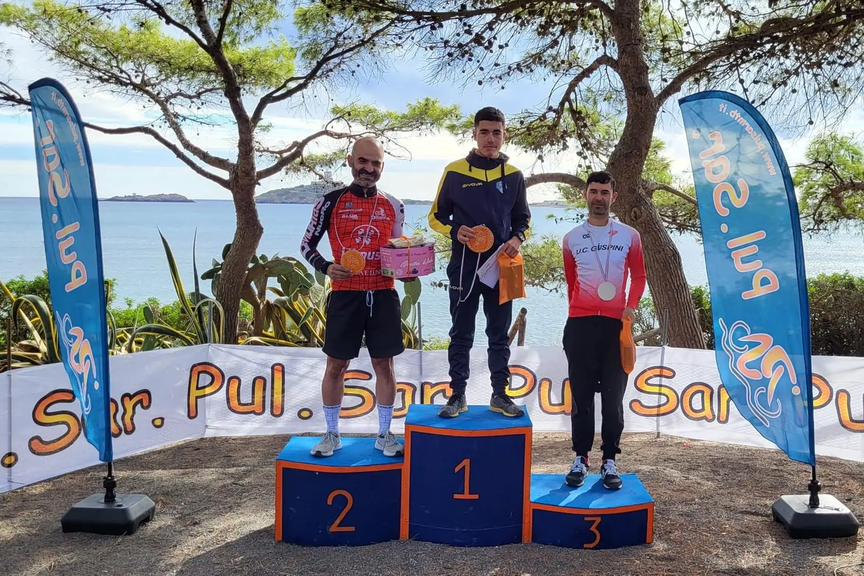 Il podio maschile gara 60': Pani, Lovicu e Saba (foto Andrea Serreli)