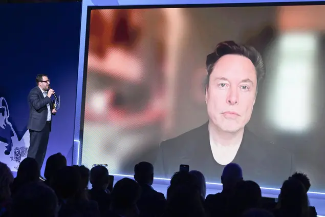 Musk in collegamento al congresso Lega (Ansa)