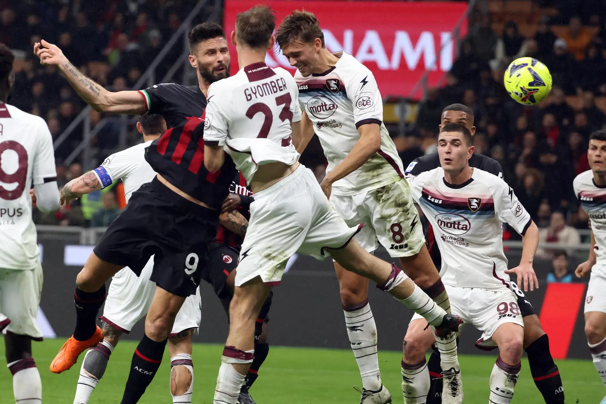 AC Milan's Olivier Giroud (L) scores goal of 1 to 0 during the Italian serie A soccer match between AC Milan and Salernitana at Giuseppe Meazza stadium in Milan, 13 March 2023. ANSA / MATTEO BAZZI