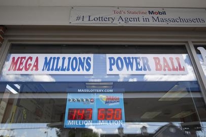 epa06908601 Electronic signage from the Massachustts State Lottery displays the estimated jackpots for the Mega Millions and Powerball lotteries at Ted's State Line Mobil in Methuen, Massachusetts, USA 24 July 2018. Ted's State Line Mobil has the highest payout of all lottery sales points in the Commonwealth of Massachusetts with a total of $15,895,112.00 (13,599.857.83 euros). The Mega Millions display erroneously shows a 630 Million USD jackpot for the 24 July, 2018 drawing. Massachusetts Lottery officials confirmed the expected rollover jackpot for 27 July, 2018 if nobody wins the 24 July drawing was accidentally transmitted within the lottery system which includes automated signage for about 20 minutes before it was corrected. EPA/CJ GUNTHER