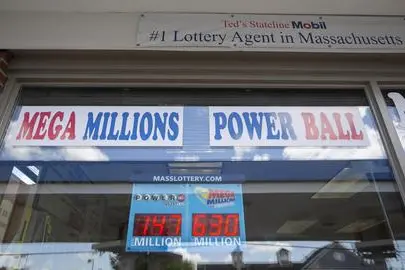epa06908601 Electronic signage from the Massachustts State Lottery displays the estimated jackpots for the Mega Millions and Powerball lotteries at Ted's State Line Mobil in Methuen, Massachusetts, USA 24 July 2018. Ted's State Line Mobil has the highest payout of all lottery sales points in the Commonwealth of Massachusetts with a total of $15,895,112.00 (13,599.857.83 euros). The Mega Millions display erroneously shows a 630 Million USD jackpot for the 24 July, 2018 drawing. Massachusetts Lottery officials confirmed the expected rollover jackpot for 27 July, 2018 if nobody wins the 24 July drawing was accidentally transmitted within the lottery system which includes automated signage for about 20 minutes before it was corrected. EPA/CJ GUNTHER