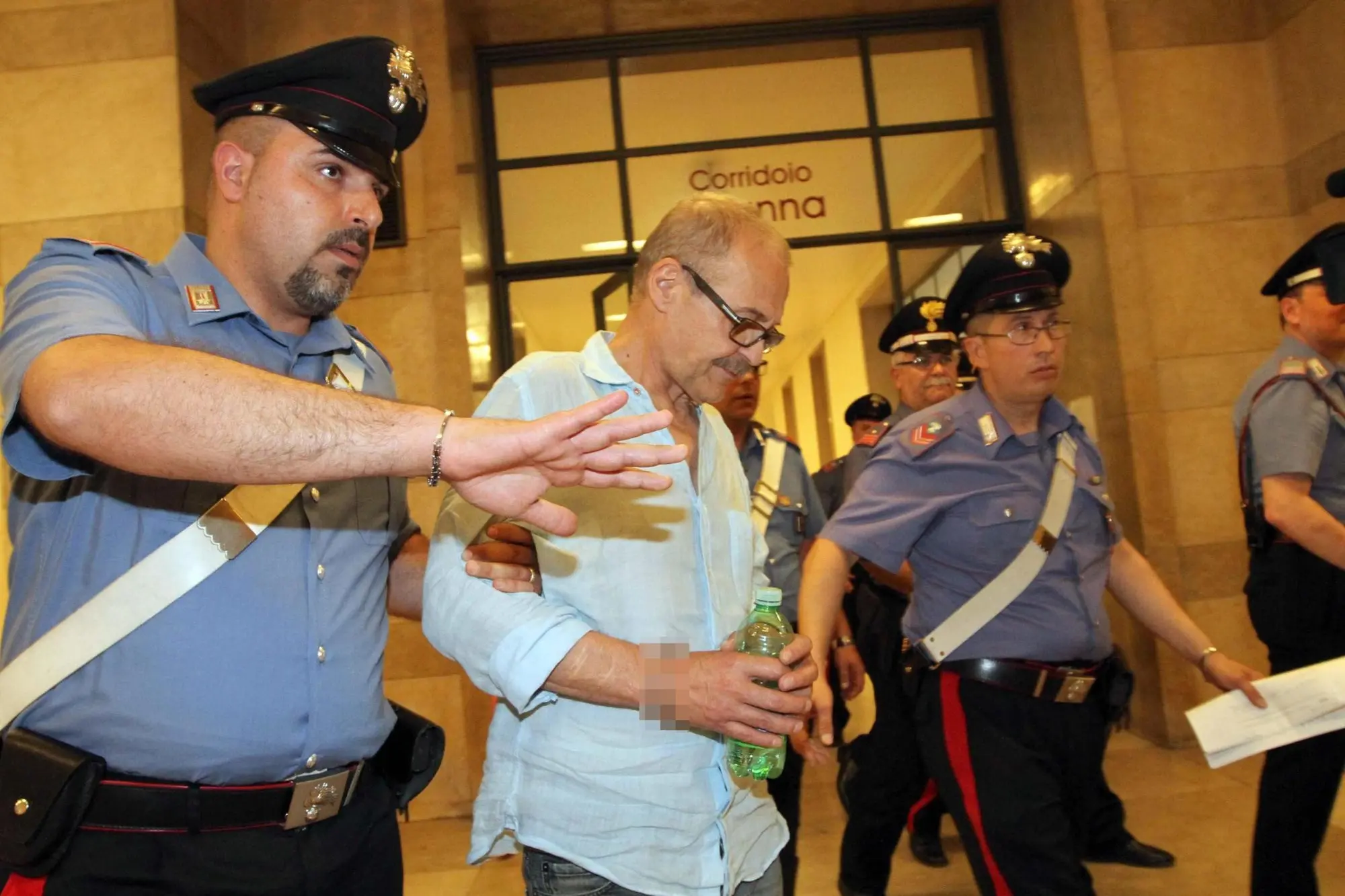 Renato Vallanzasca in tribunale a Milano al processo per direttissima dopo essere stato fermato per furto, 14 giugno 2014. ANSA/STEFANO PORTA