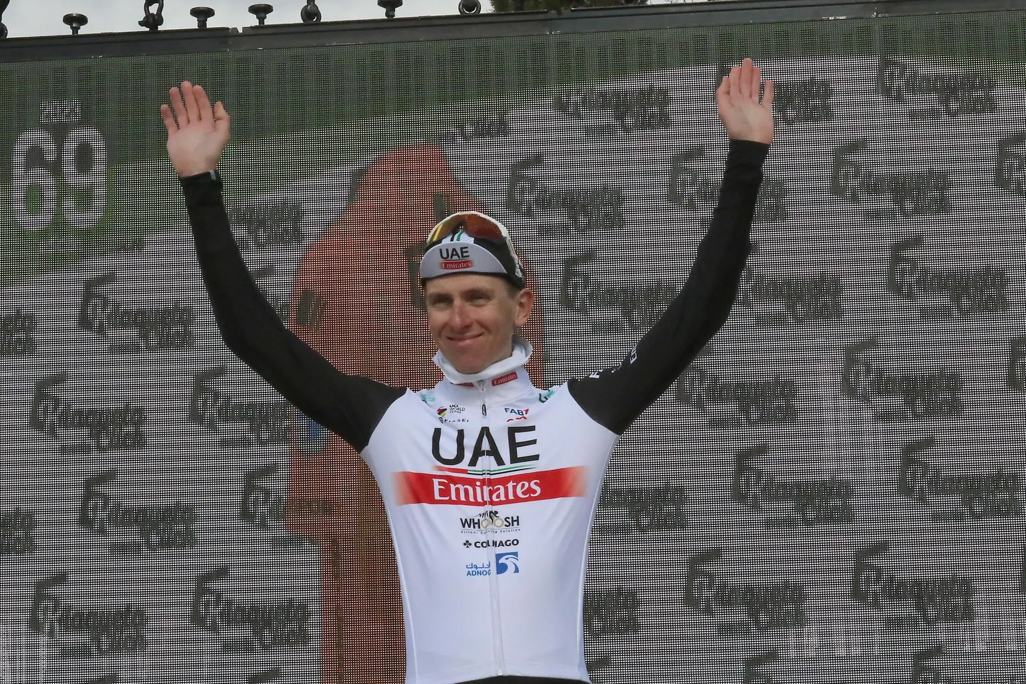 epa10470918 Slovenian rider Tadej Pogacar of UAE team Emirates celebrates on the podium after winning the second stage of 69th Vuelta Ciclista a Andalucia-Ruta del Sol race, from Diezma to Alcala la Real, race over 156 km, in Jaen, Andalusia, southern Spain, 16 February 2023. EPA/Pepe Torres