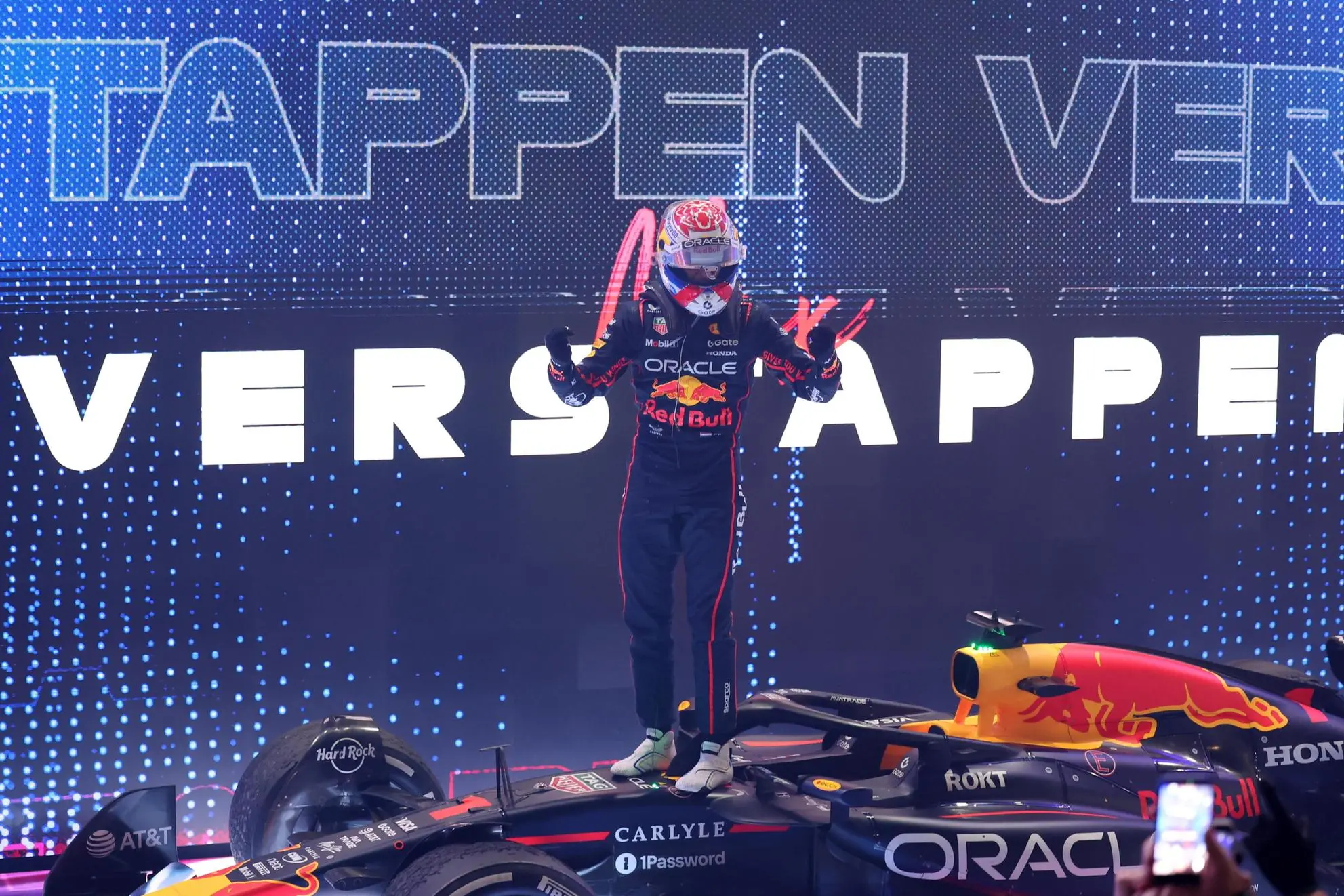 epa12560370 Red Bull Racing driver Max Verstappen of Netherlands celebrates after winning in the Formula 1 Qatar Grand Prix at the Lusail International Circuit racetrack outside Doha, Qatar, 30 November 2025. EPA/ALI HAIDER