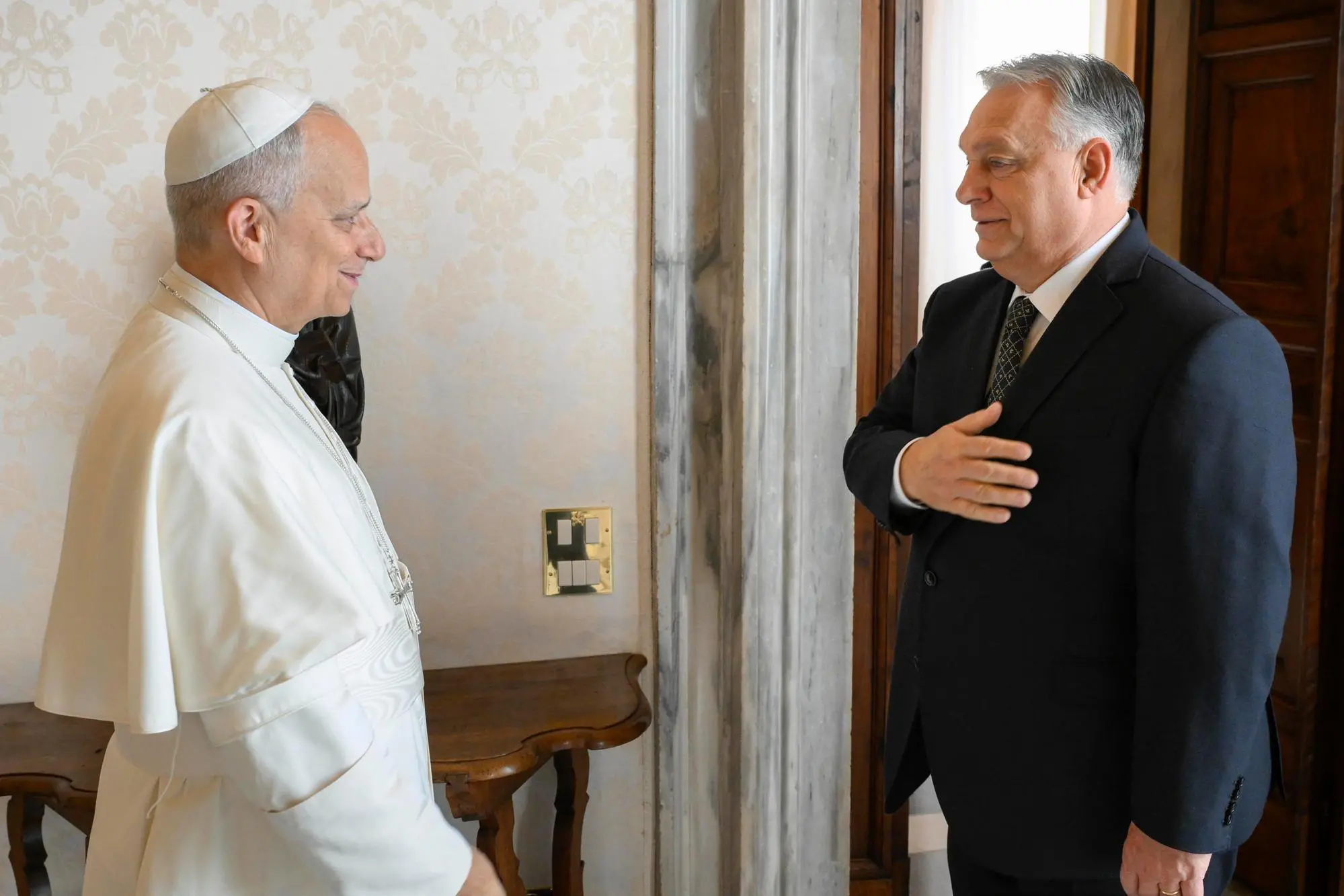 A handout picture, provided by Vatican Media Press Office, shows Pope Leo and Viktor Orban, during the visit in Vatican City of the Prime Minister of Hungary, 27 ottobre 2025. ANSA / Vatican Media Press Office handout +++ ANSA PROVIDES ACCESS TO THIS HANDOUT PHOTO TO BE USED SOLELY TO ILLUSTRATE NEWS REPORTING OR COMMENTARY ON THE FACTS OR EVENTS DEPICTED IN THIS IMAGE - NO ARCHIVING - NO LICENSING - NPK +