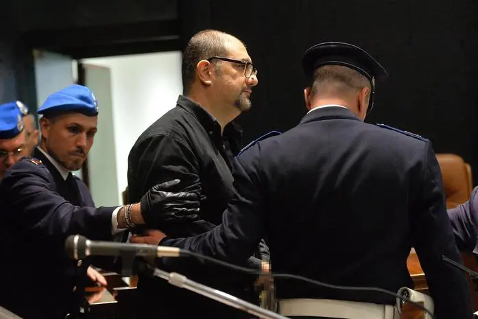 Alfredo Cospito in tribunale nel 2013 (Ansa)