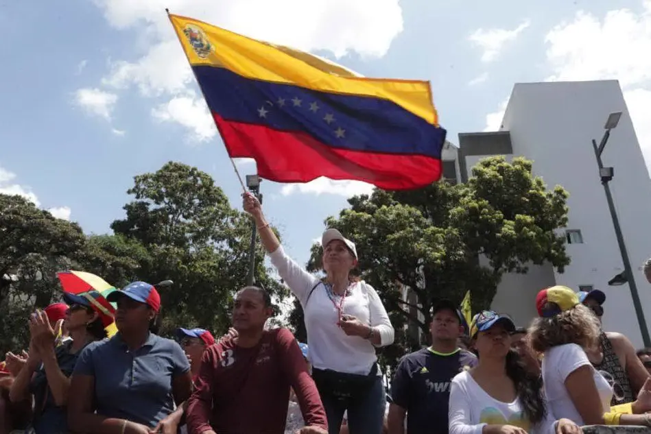 Una manifestazione a Caracas (Ansa)