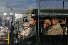 Profughi ucraini in partenza da Leopoli all'inizio della guerra