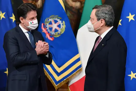 Italy's new Prime Minister Mario Draghi (R) and outgoing prime minister Giuseppe Conte, during the handover ceremony at Chigi Palace in Rome, Italy, 13 February 2021. Former European Central Bank (ECB) chief Mario Draghi has been sworn in on the day as Italy's prime minister after he put together a government securing broad support across political parties following the previous coalition's collapse. ANSA/ ETTORE FERRARI/pool