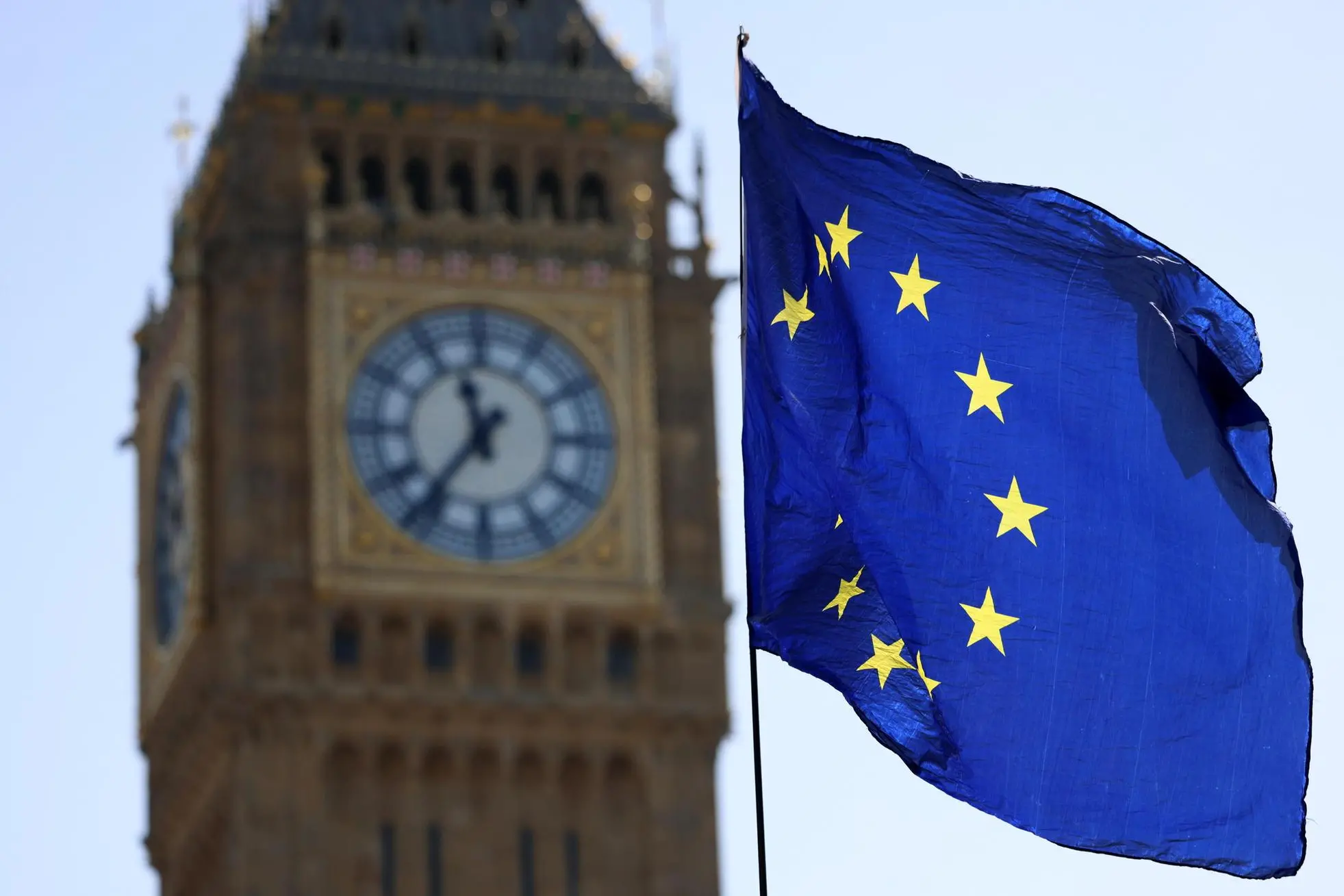 epa12064647 The EU flag flies outside the British parliament in London, Britain, 30 April 2025. The United States has warned that Britain's Brexit reset with the European Union (EU) may reduce the chance of a future trade deal with Washington. EPA/ANDY RAIN