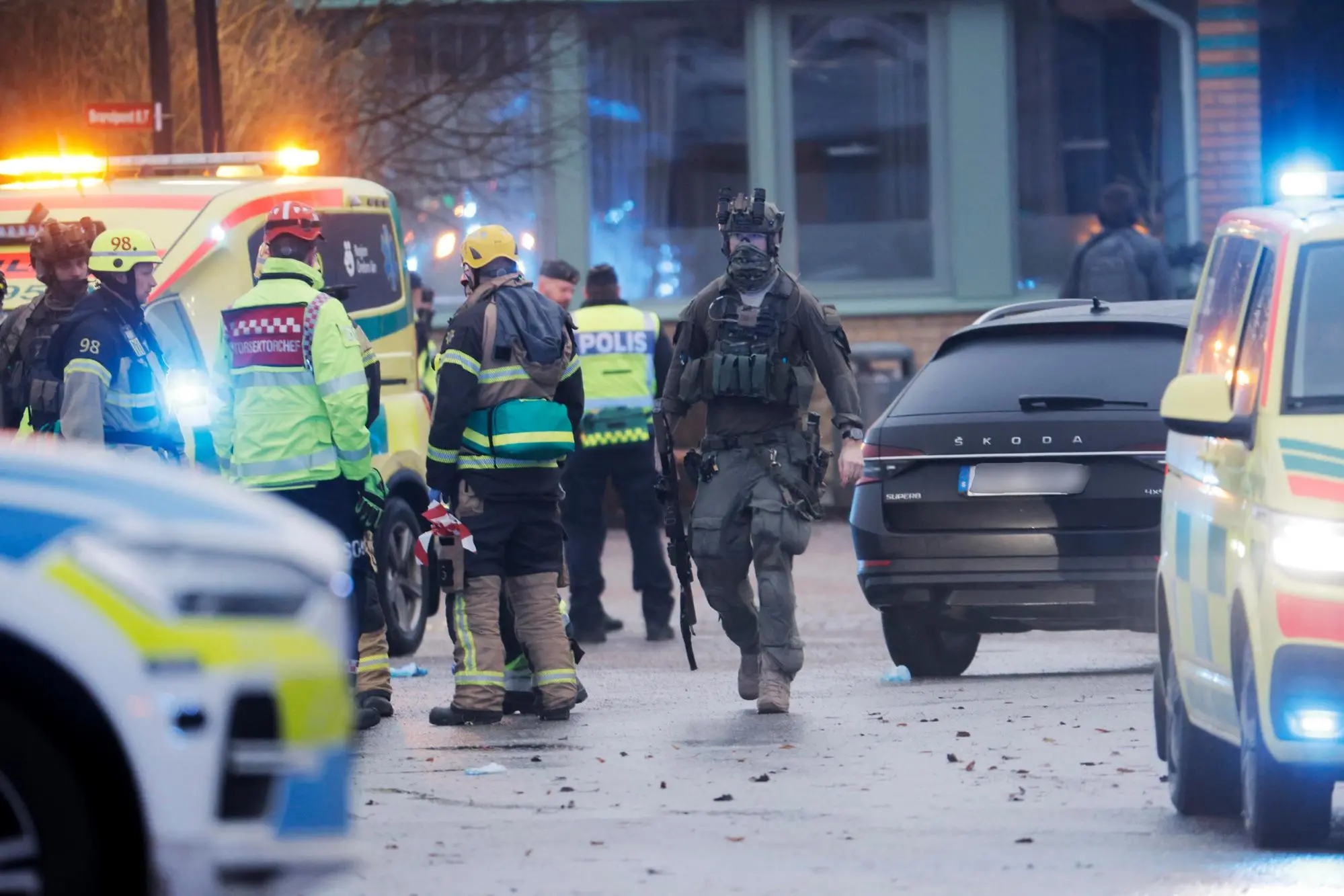 epa11874708 Emergency personnel gather after a shooting at Risbergska School in Orebro, Sweden, 04 February 2025. According to police, five people were shot at the school. EPA/Kicki Nilsson SWEDEN OUT