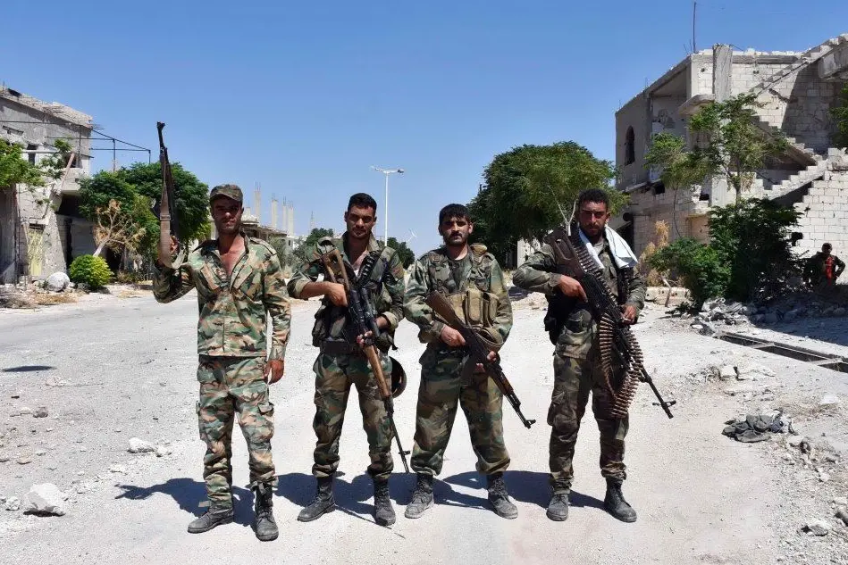 Militari dell'esercito di Assad a Idlib (Ansa)