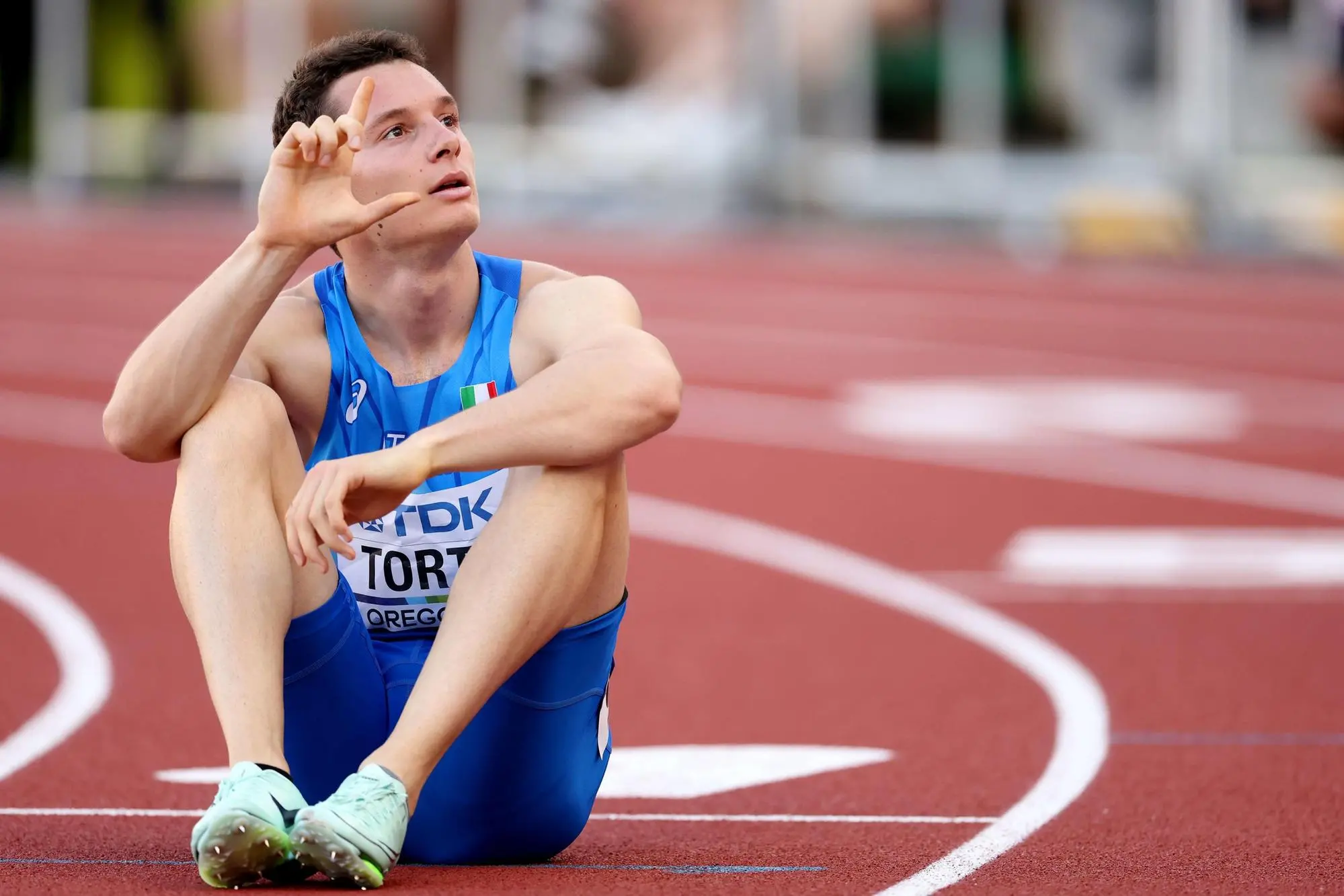 EUGENE, OREGON - JULY 19: Filippo Tortu of Team Italy reacts after competing in the Men's 200m Semi-Final on day five of the World Athletics Championships Oregon22 at Hayward Field on July 19, 2022 in Eugene, Oregon. Christian Petersen/Getty Images/AFP == FOR NEWSPAPERS, INTERNET, TELCOS & TELEVISION USE ONLY ==