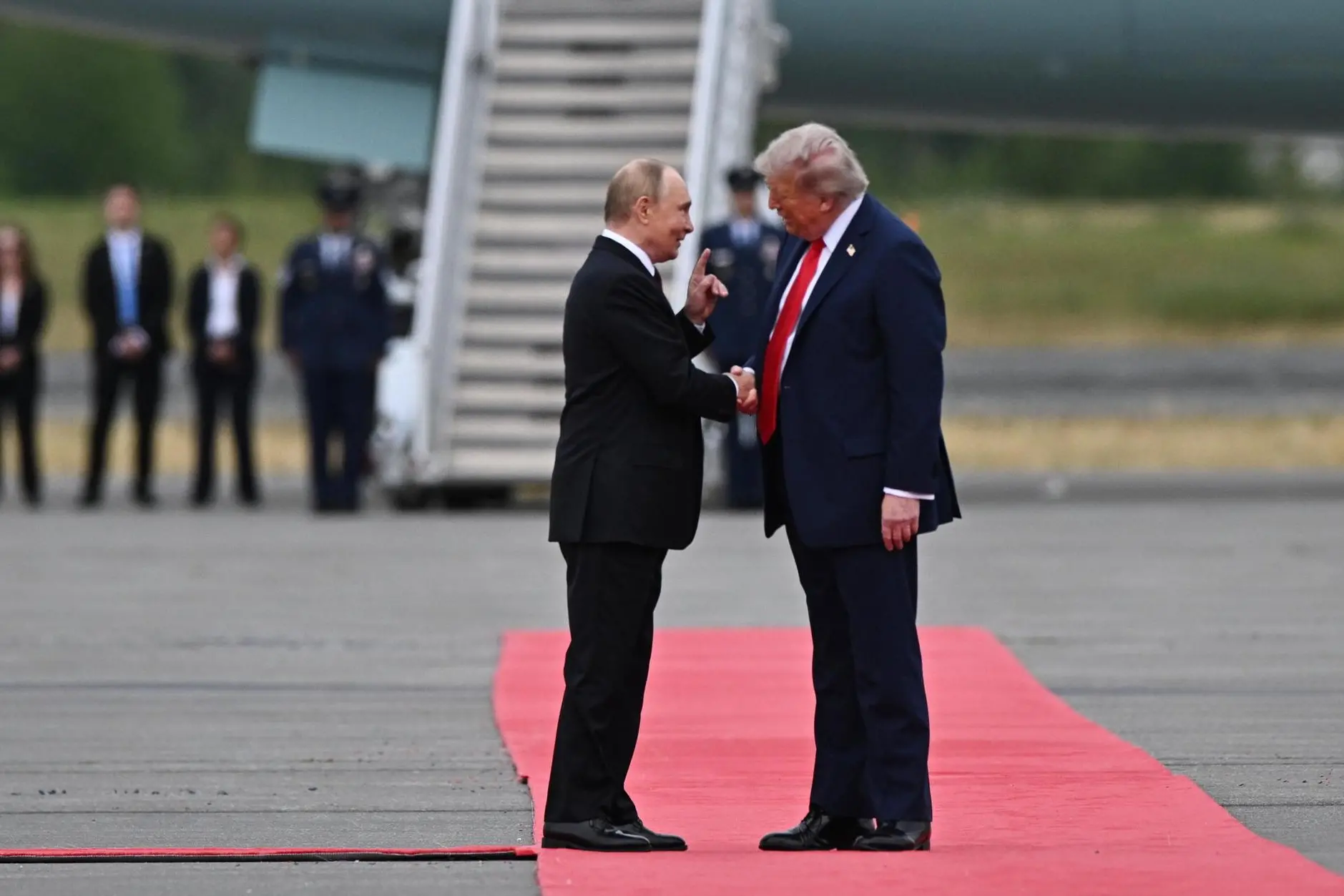 epaselect epa12303523 US President Donald Trump (R) welcomes Russian President Vladimir Putin during their meet to negotiate at Joint Base Elmendorf-Richardson in Anchorage, Alaska, USA, 15 August 2025. EPA/SERGEY BOBYLEV/SPUTNIK/KREMLIN POOL / POOL MANDATORY CREDIT