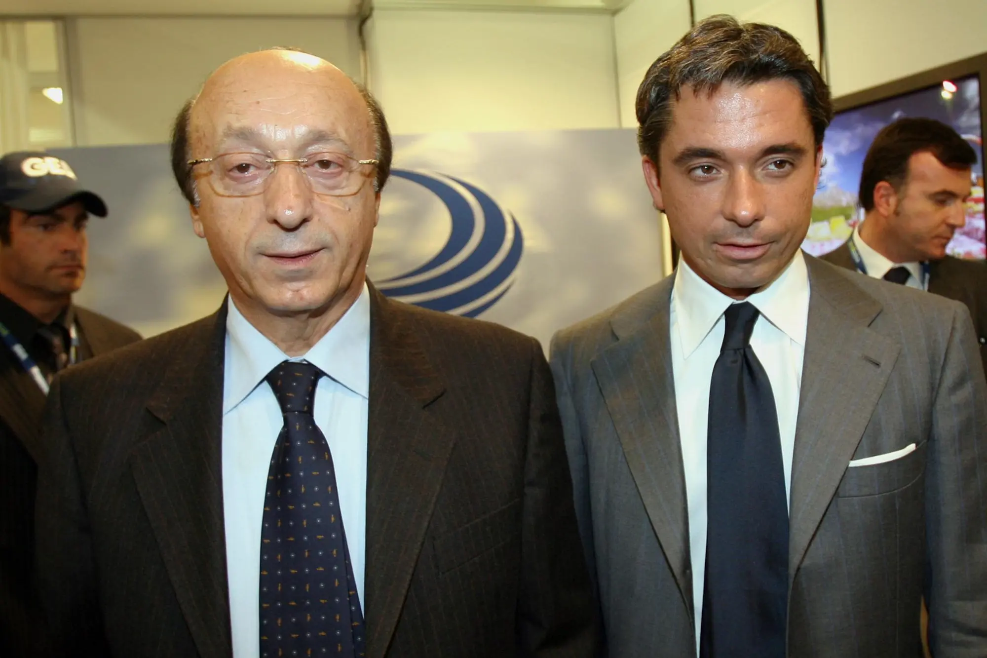 ** FILE ** Luciano, left, and Alessandro Moggi attend the 'Expogoal' soccer fair in Milan, Italy, in this Monday, Nov.14, 2005 file photo. Italian media are publishing wiretaps from past and closed Italian prosecutors' investigations on sports fraud, of phone conversations between soccer officials with references to referee designation for soccer matches. (AP Photo/Luca Bruno)