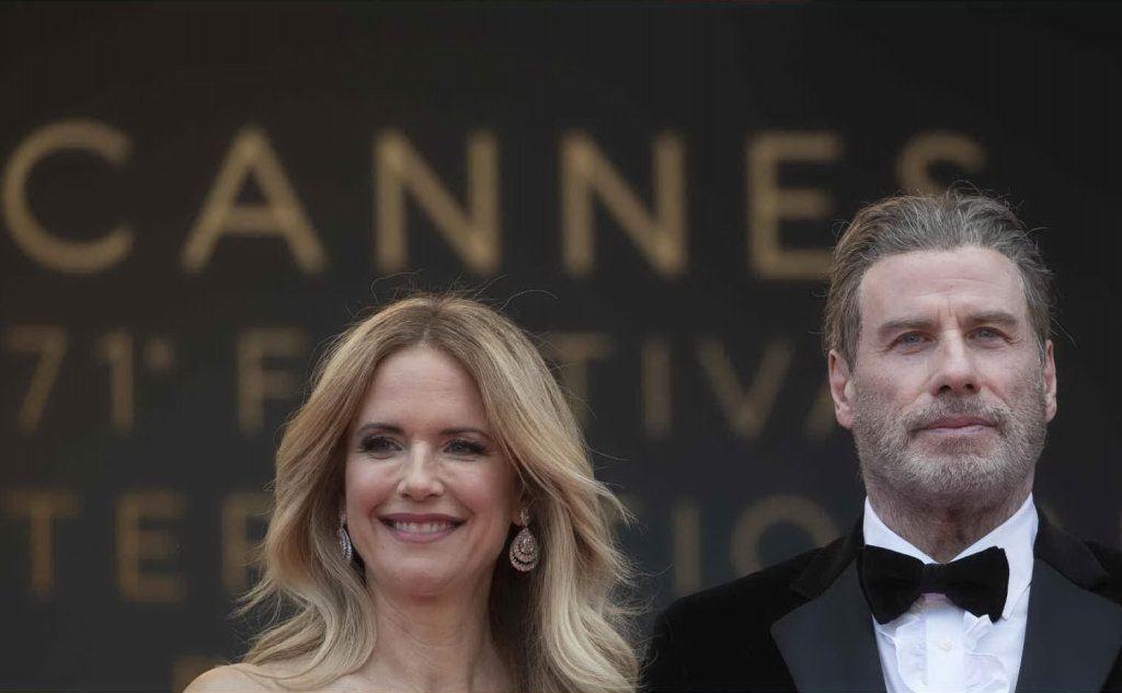 Con la moglie Kelly Preston all'ultima edizione del festival di Cannes (Ansa)