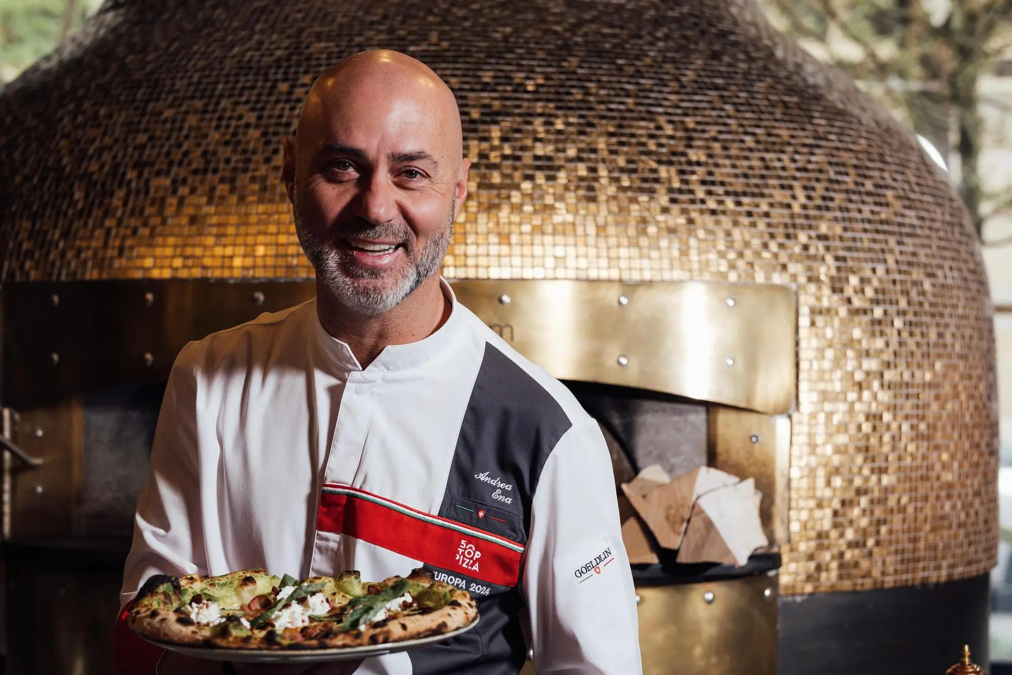 Andrea Ena, 46 anni, nel suo locale nel cuore di Bratislavia, capitale della Slovacchia (foto concessa da Andrea Ena)