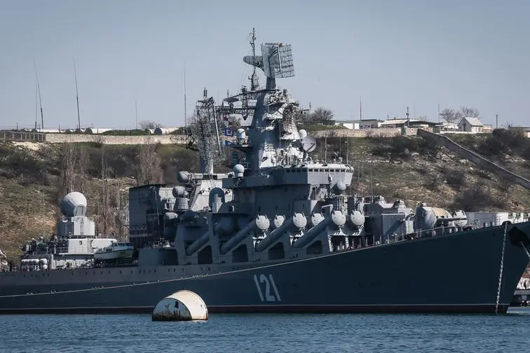 epa09889521 (FILE) - Russian Navy flagship missile cruiser 'Moskva' moored in the bay of the Crimean city of Sevastopol, 30 March 2014 (reissued 14 April 2022). The Black Sea fleet's flagship, the RTS Moskva, was damaged after ammunition on board the vessel caught fire, according to Russia state media citing the Defence Ministry. EPA/SERGEI ILNITSKY *** Local Caption *** 51305252