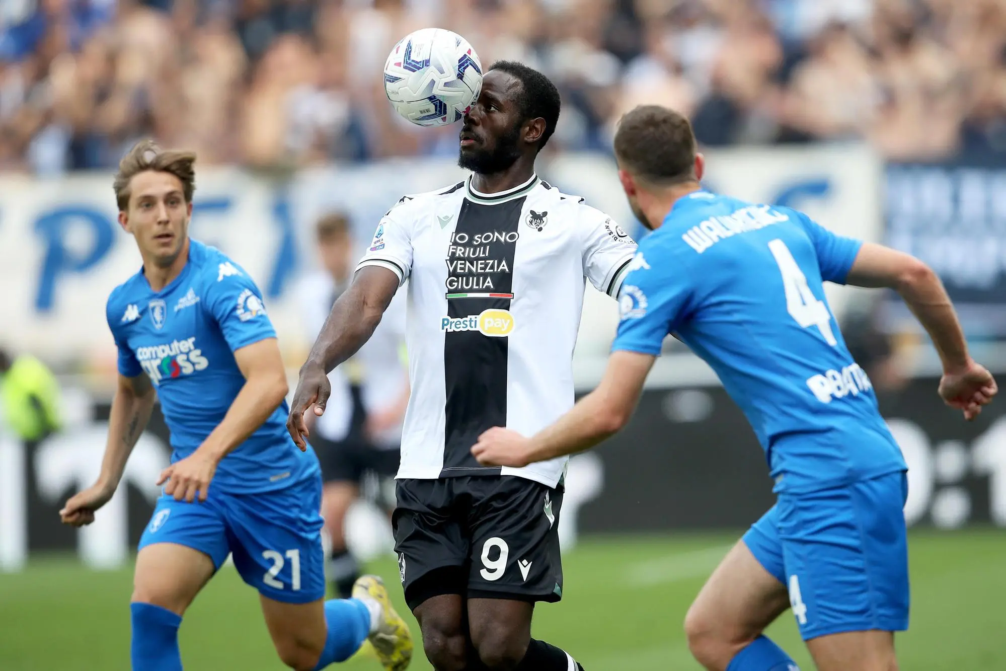 Udinese's Keinan Davis (L) and Empoli's Sebastian Walukiewicz in action during the Italian Serie A soccer match Udinese Calcio vs Empoli FC at the Friuli - Dacia Arena stadium in Udine, Italy, 19 May 2024. ANSA / GABRIELE MENIS