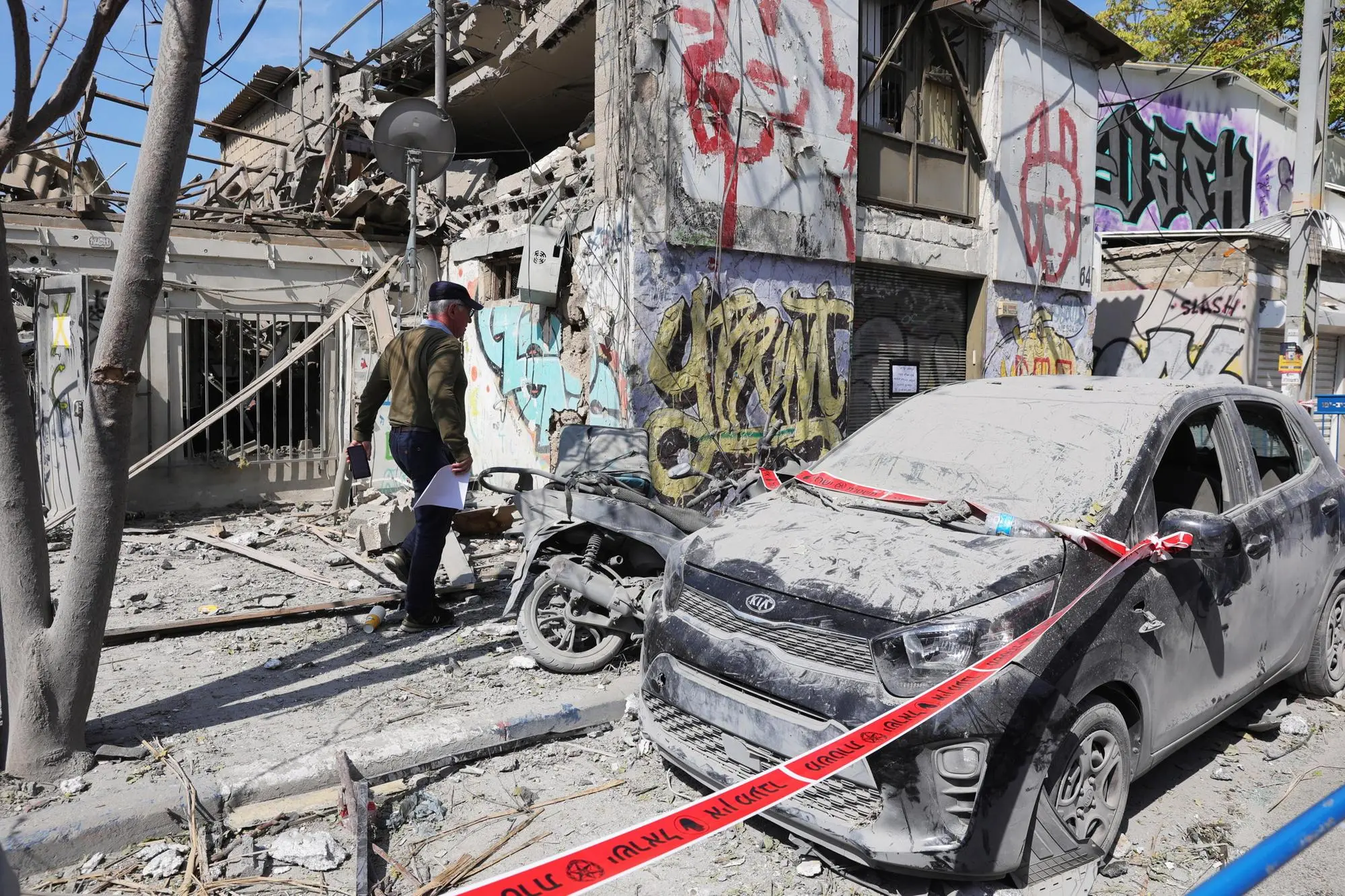 epaselect epa10906900 The site of a destroyed building in Tel Aviv, Israel, 08 October 2023, following overnight Hamas rocket attacks. Rocket barrages were launched from the Gaza Strip as of early 07 October in a surprise attack claimed by the Islamist movement Hamas. More than 300 Israelis were killed and over 1,000 left injured in the attacks, the Israeli foreign ministry said. EPA/ABIR SULTAN