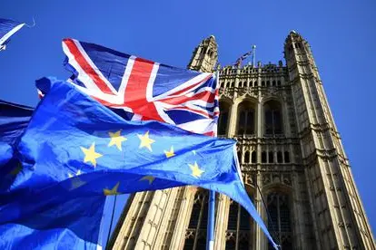 epa07940748 British and EU flags outside Parliament in London, Britain, 22 October 2019. MPs (Members of Parliament) are set to vote on British Prime Minister Boris Johnson's Brexit timetable on 22 October. EPA/ANDY RAIN