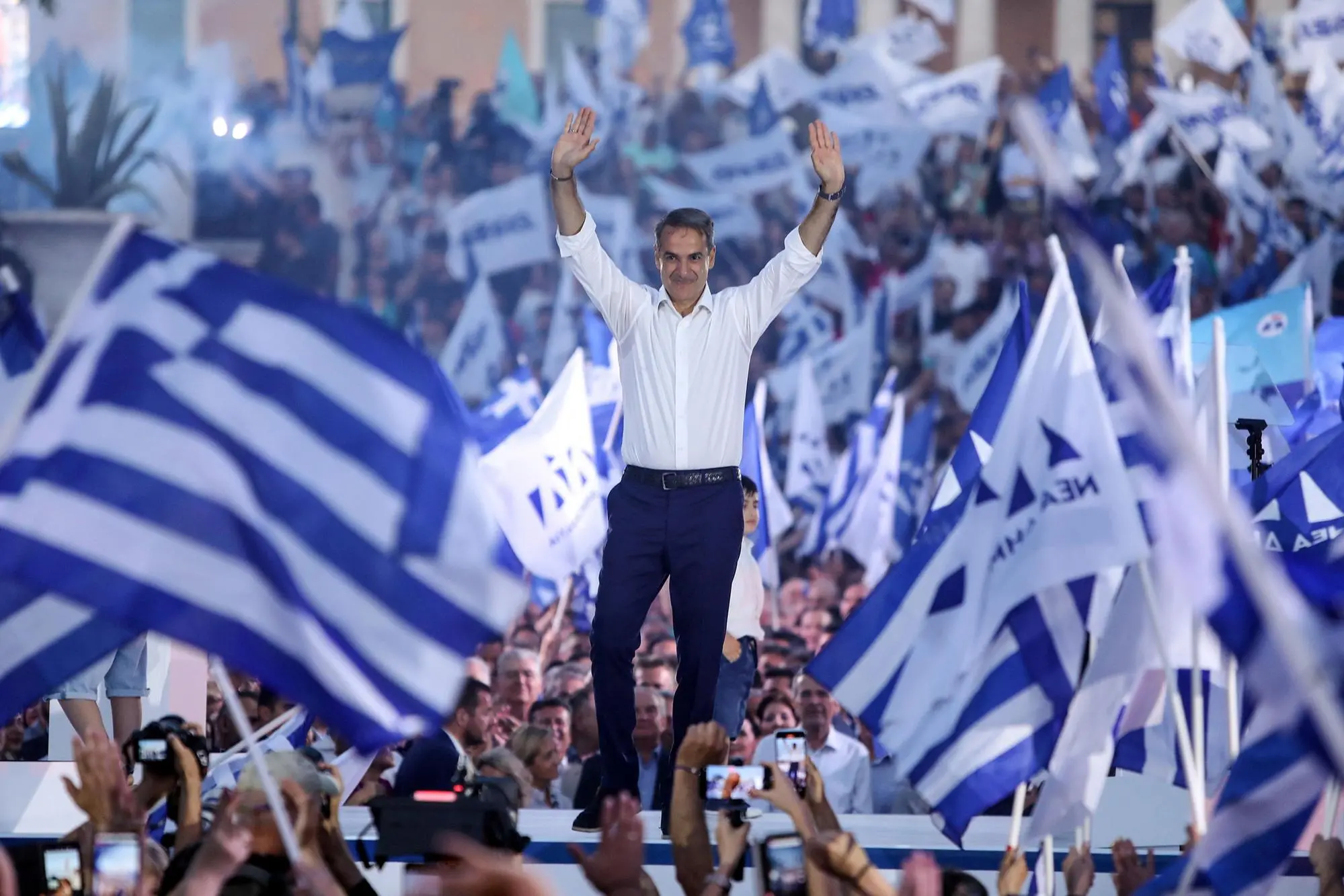 epa10708568 Leader of New Democracy party Kyriakos Mitsotakis waves to his supporters during his main pre-election rally, at Syntagma square in Athens, Greece, 23 June 2023. Greece's national and parliamentary elections will be held on 25 June. EPA/GEORGE VITSARAS