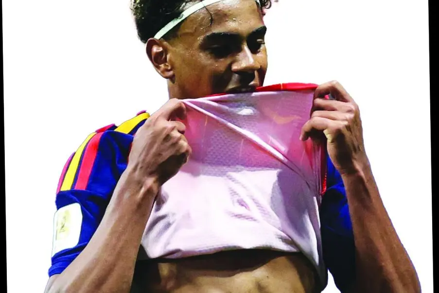 epa13054636 Lamine Yamal of Spain bites his jersey during the FIFA World Cup 2026 group stage match Spain against Saudi Arabia, in Atlanta, USA, 21 June 2026. EPA/RONALD WITTEK
