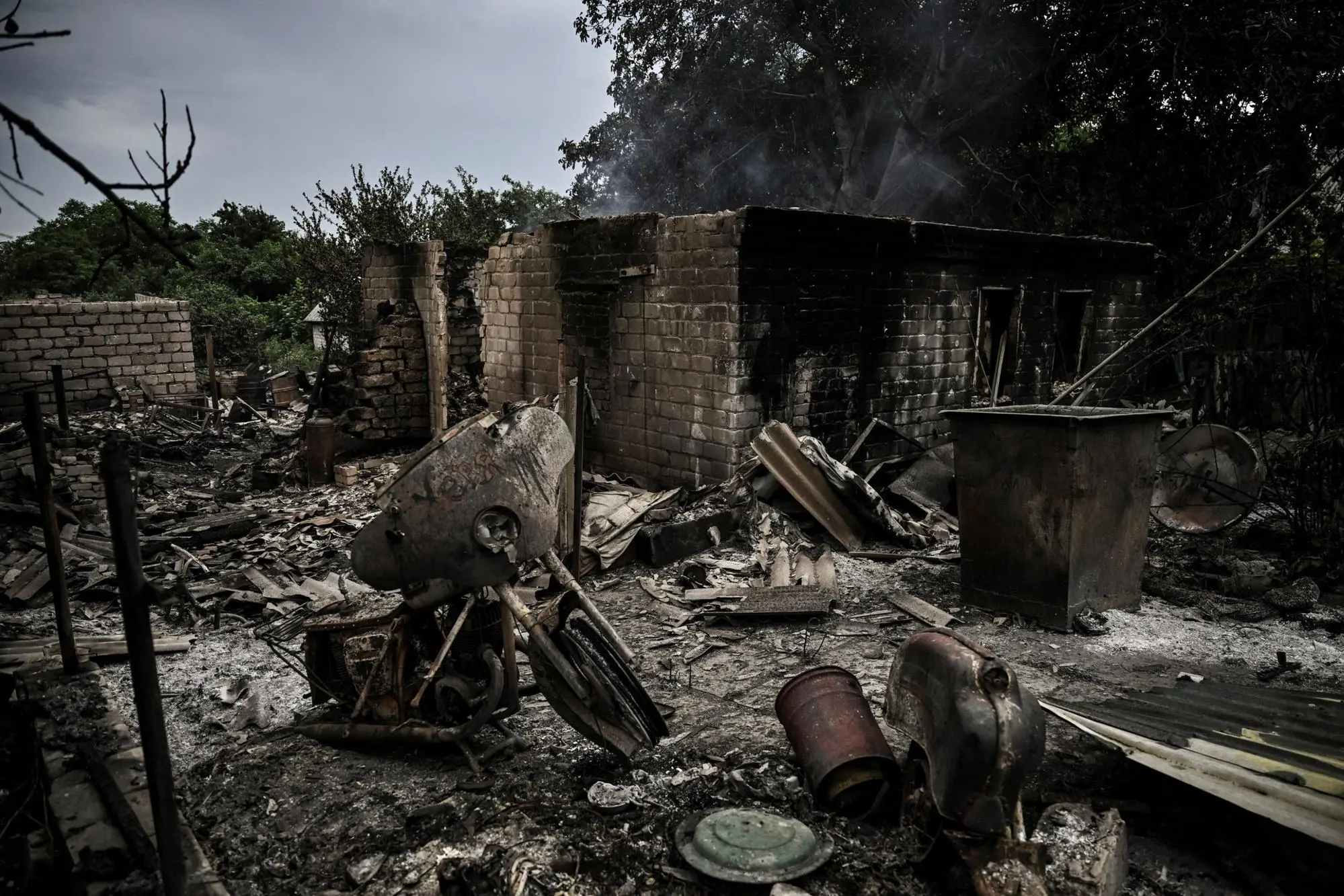 A totally destroyed house is pictured after shelling in the city of Lysychansk in the eastern Ukrainian region of Donbas on June 13, 2022, amid Russian invasion of Ukraine. - The cities of Severodonetsk and Lysychansk, which are separated by a river, have been targeted for weeks as the last areas still under Ukrainian control in the eastern Lugansk region. (Photo by ARIS MESSINIS / AFP)