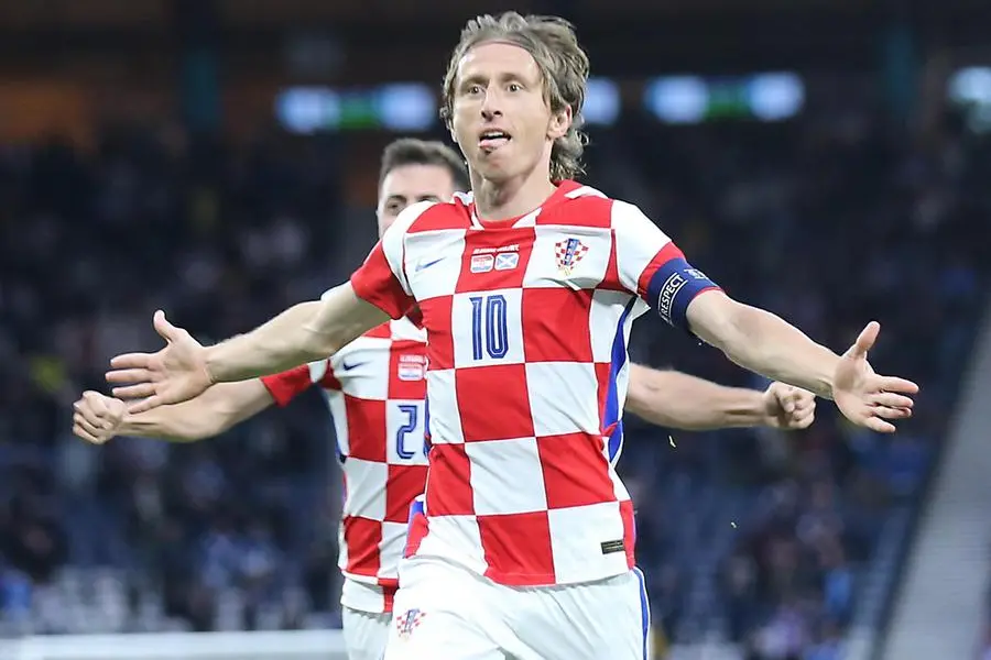 Il fuoriclasse croato Luka Modric esulta dopo il gran gol realizzato alla Scozia (Ansa)