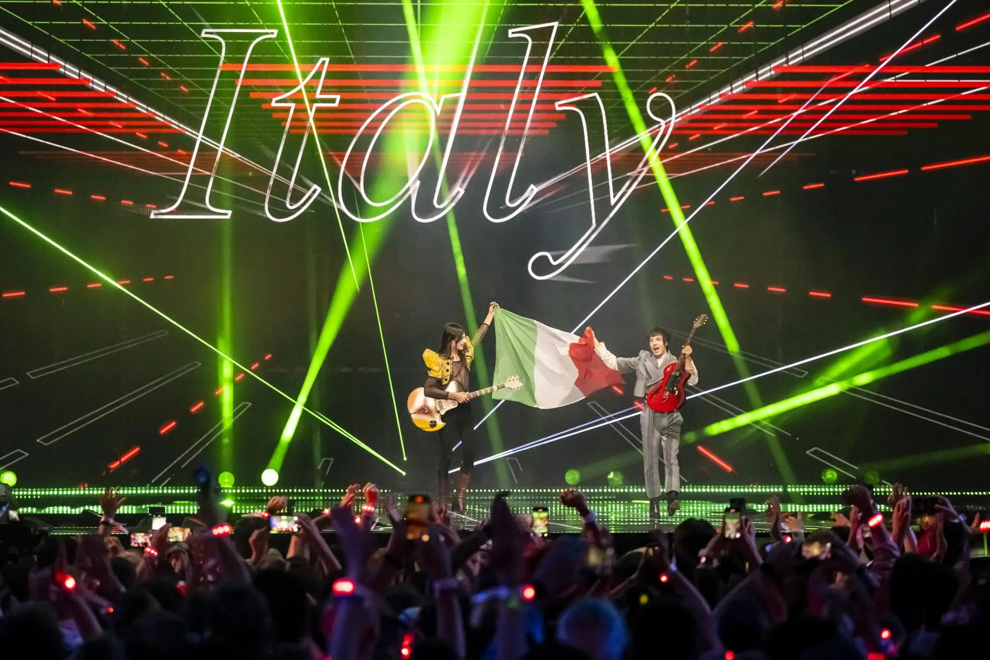 epa12111159 Italy's Lucio Corsi takes part in the flag parade during the final at the 69th Eurovision Song Contest in Basel, Switzerland, 17 May 2025. EPA/GEORGIOS KEFALAS