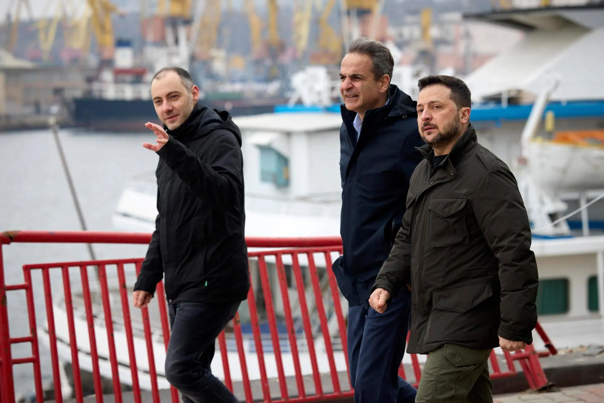 epa11202370 A handout photo made available by the presidential press service shows Ukrainian President Volodymyr Zelensky (R) and Greek Prime Minister Kyriakos Mitsotakis (C) visiting the seaport during their meeting in the southern Ukrainian city of Odesa, 06 March 2024. The Greek prime minister arrived in Odesa to meet with top Ukrainian officials amid the Russian invasion. EPA/PRESIDENTIAL PRESS SERVICE HANDOUT HANDOUT EDITORIAL USE ONLY/NO SALES HANDOUT EDITORIAL USE ONLY/NO SALES