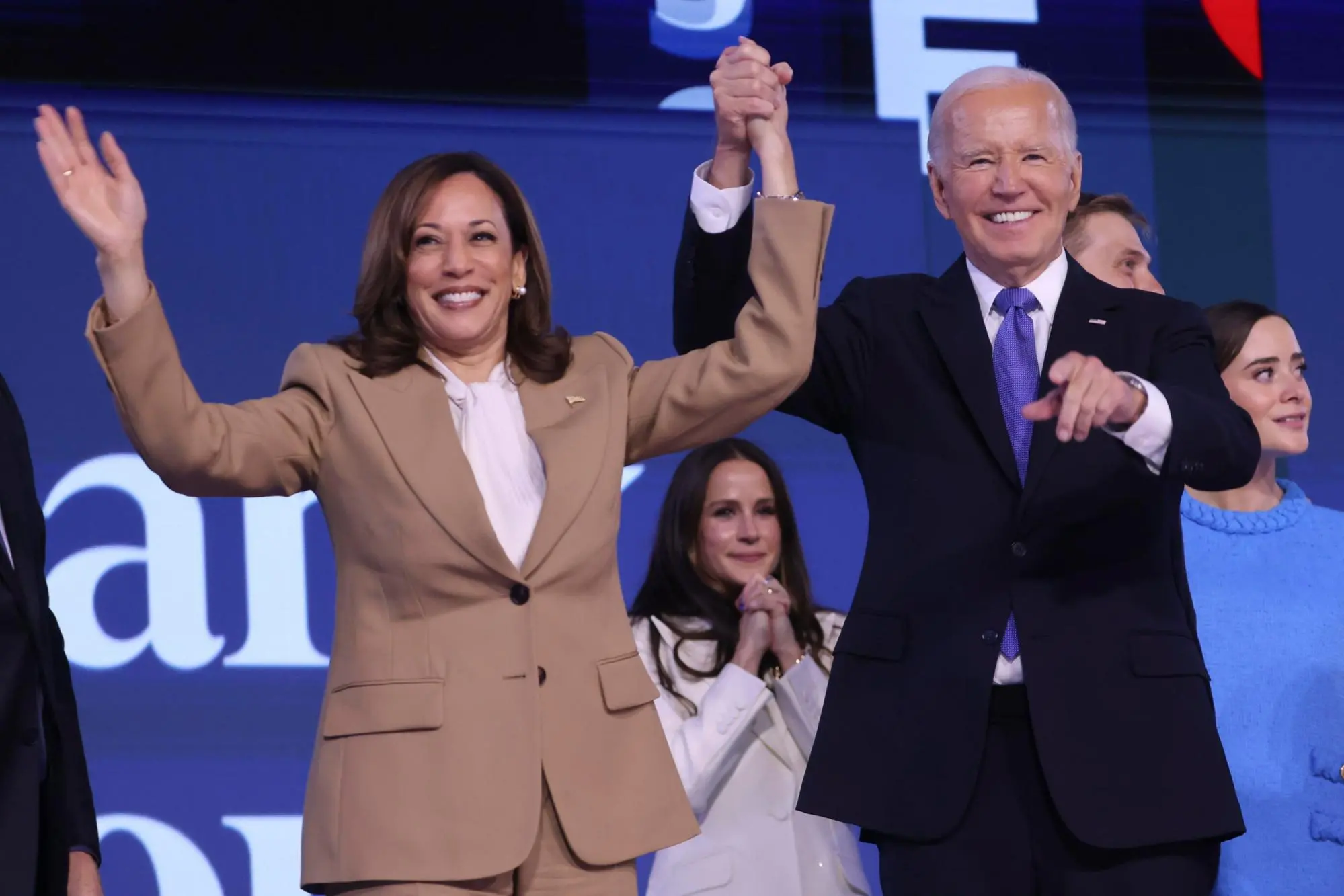 epaselect epa11556157 US President Joe Biden and Vice President Kamala Harris wave to the audience following Biden's speech on the opening night of the Democratic National Convention (DNC) at the United Center in Chicago, Illinois, USA, 19 August 2024. The 2024 Democratic National Convention is being held from 19 to 22 August 2024, during which delegates of the United States' Democratic Party will vote on the party's platform and ceremonially vote for the party's nominee for president, Vice President Kamala Harris, and for vice president, Governor Tim Walz of Minnesota, for the upcoming presidential election. EPA/JUSTIN LANE