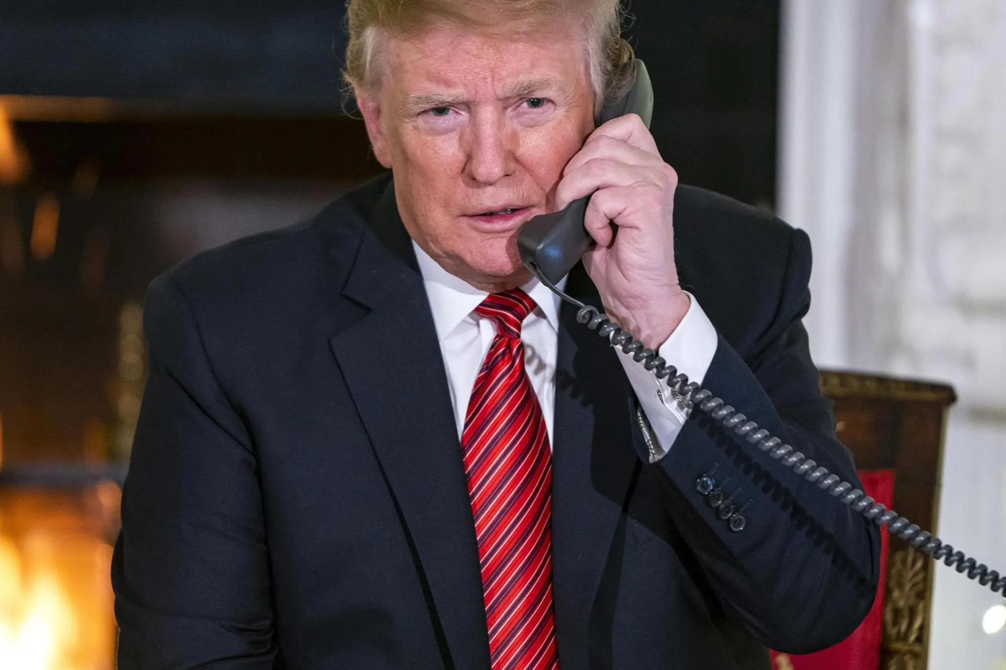 epa07253180 (FILE) - US President Donald J. Trump speaks with children who are calling the NORAD (North American Aerospace Defense Command) Santa tracker in the State Dining Room of the White House in Washington, DC, USA, 24 December 2018 (reissued 29 December 2018). Trump said on Twitter on 29 December 2018 that he had a 'long and very good call' with Chinese President Xi Jinping on a possible trade deal between the United States and China. EPA/JIM LO SCALZO