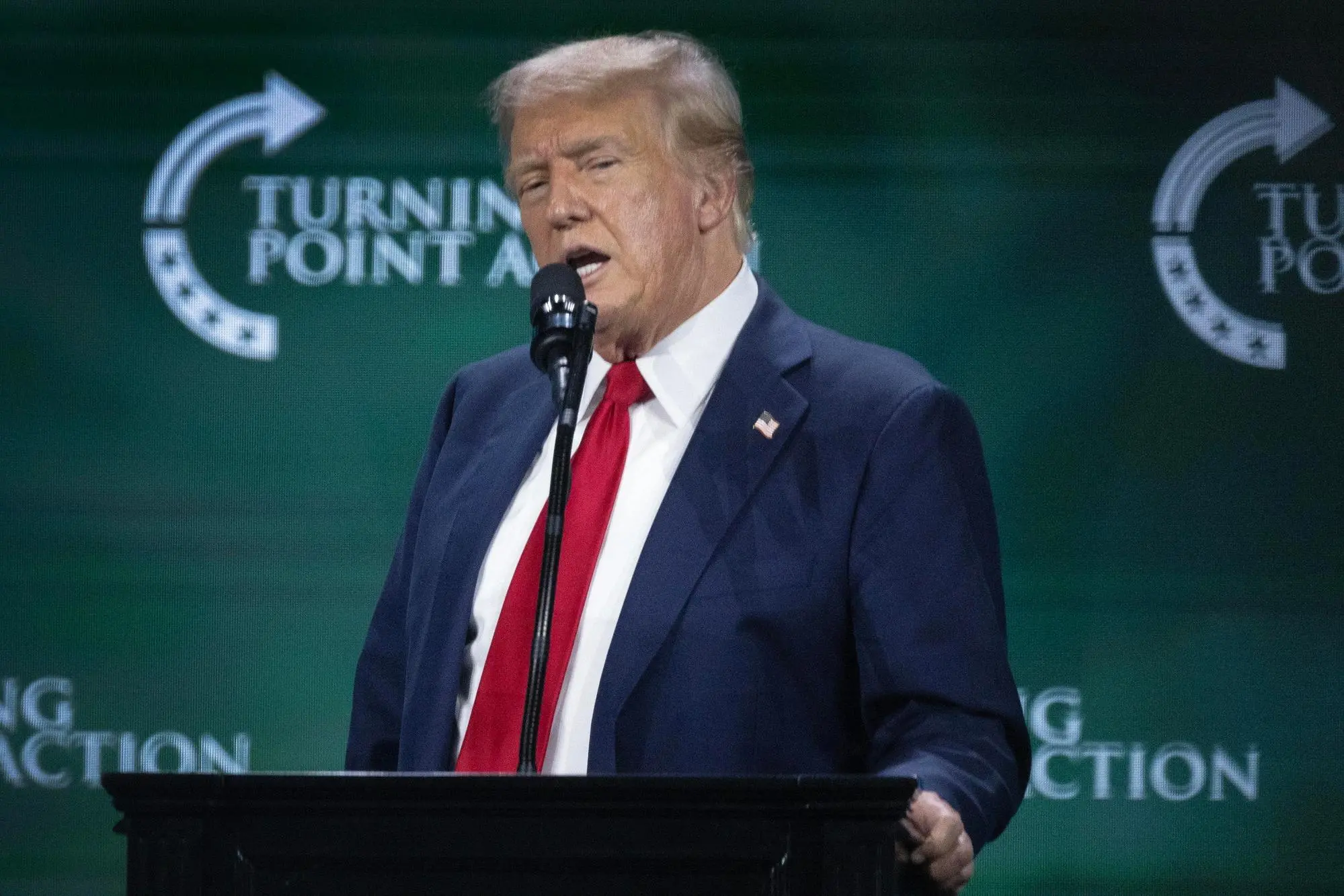 epa11498387 Former US President Donald Trump delivers remarks during Turning Point Action's 'Believers Summit' in West Palm Beach, Florida, USA, 26 July 2024. Turning Point Action is a conservative organization founded in 2019. Its mission is to embolden the conservative base through grassroots activism and provide voters with resources to elect conservative leaders. EPA/CRISTOBAL HERRERA-ULASHKEVICH