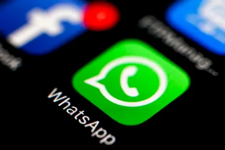 epa09442518 (FILE) - The logo of the messaging application WhatsApp on a smartphone in Taipei, Taiwan, 07 April 2016 (reissued 02 September 2021). The Irish Data Protection Commissioner (DPC) in a statement on 02 September 2021 announced it had 'imposed a fine of 225 million euro on WhatsApp' Ireland over the messenger application's handling data sharing with its parent company Facebook. EPA/RITCHIE B. TONGO *** Local Caption *** 52735033