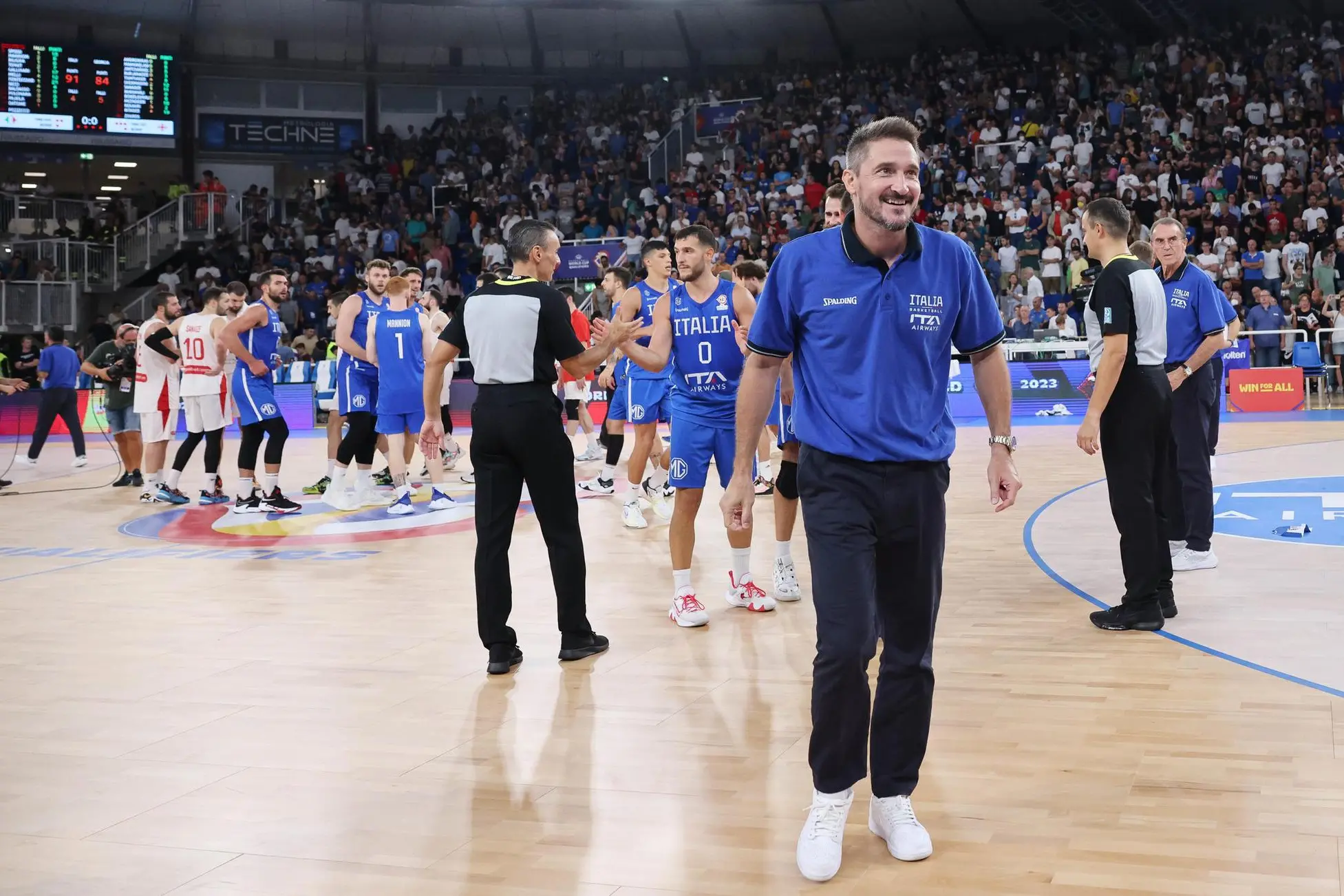 Italy's head coach Gianmarco Pozzecco celebrates the victory at the end of the FIBA World Cup qualifiers basket match Italy vs Georgia at the Palaleonessa Arena in Brescia, Italy, 27 August 2022. ANSA/SIMONE VENEZIA