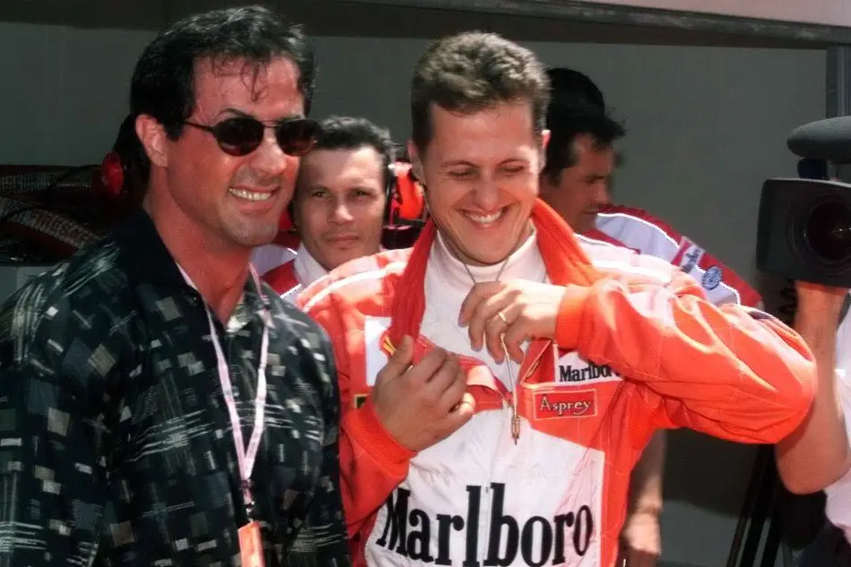L'attore Sylvester Stallone in compagnia del ferrarista Michael Schumacher