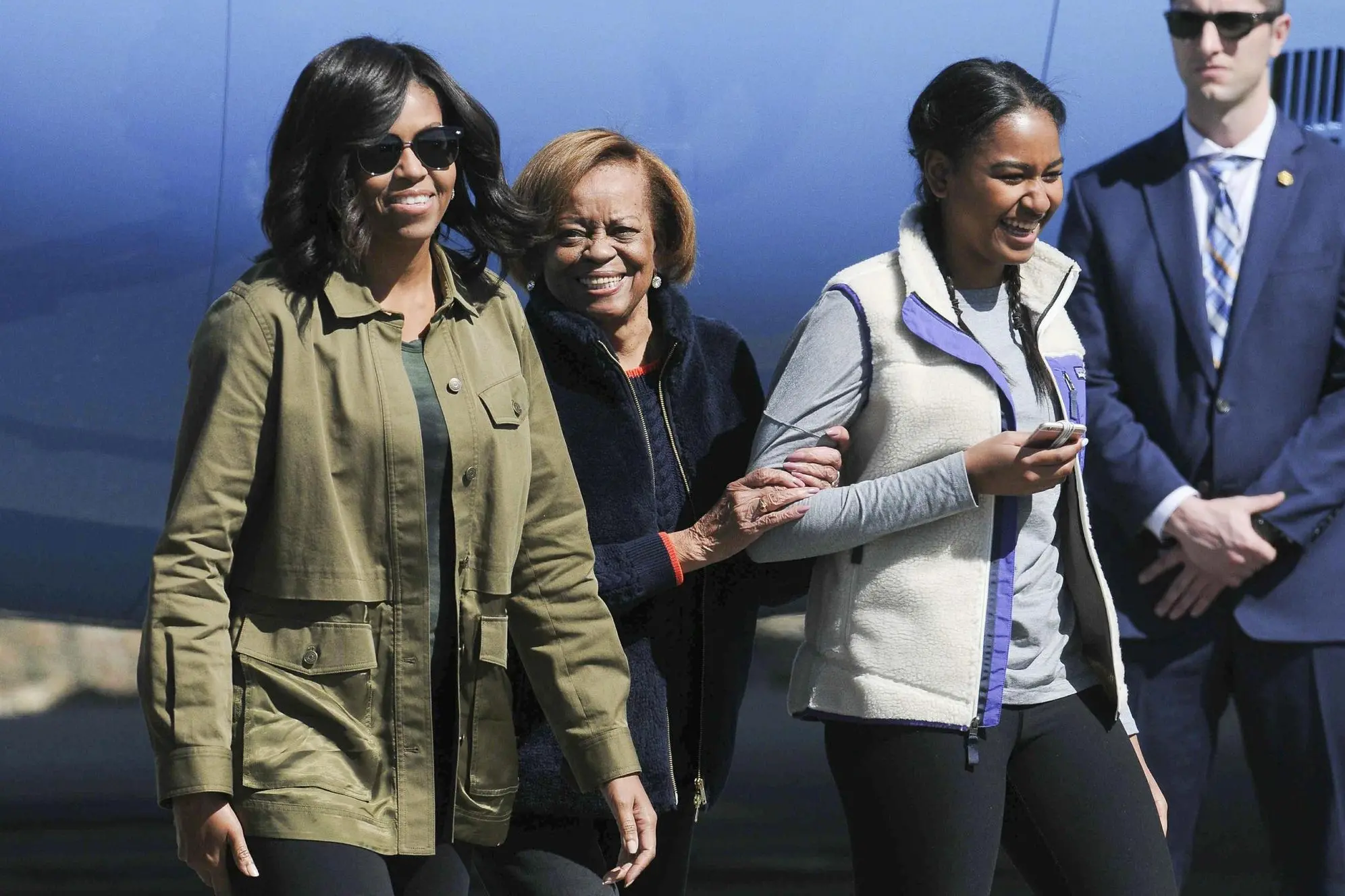 Michelle Obama con la figlia Sasha e la madre Marian Robinson (Ansa)