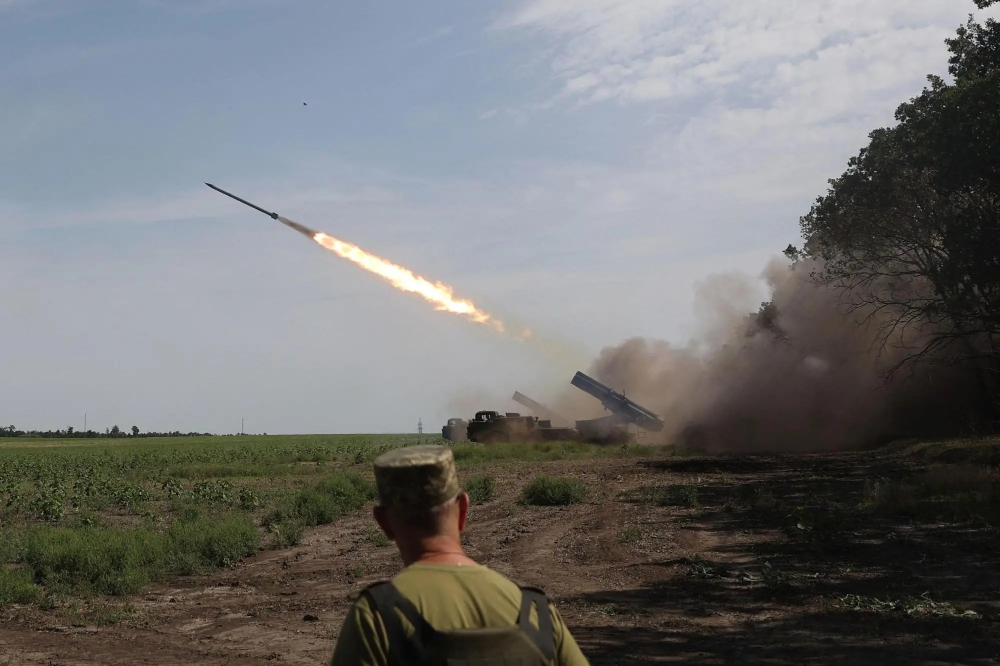 Ukrainian artillery unit fires with a BM-27 Uragan, a self-propelled 220 mm multiple rocket launcher, at a position near a frontline in Donetsk region on August 27, 2022, amid the Russian invasion of Ukraine. (Photo by Anatolii Stepanov / AFP)