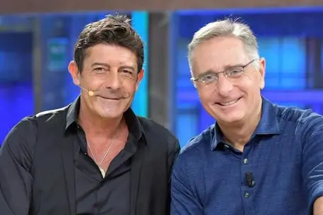 Luca Laurenti con Paolo Bonolis (Ansa)