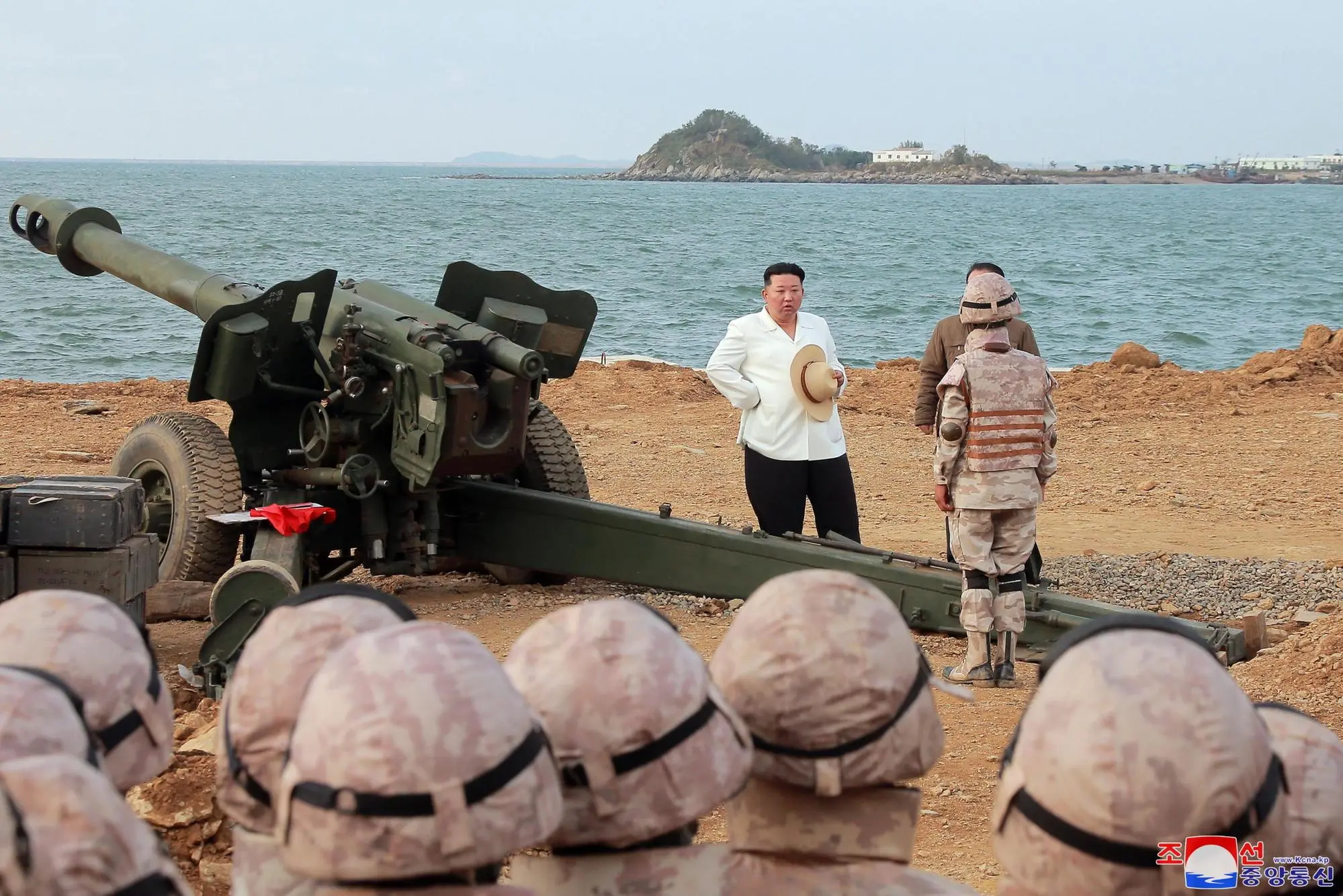 epa10233813 An undated photo released on 10 October 2022 by the official North Korean Central News Agency (KCNA) shows North Korean Supreme Leader Kim Jong-un overseeing a military striking drill of long-range artillery sub-units on the front and flying corps of the Korean People's Army (KPA), carried out to check and assess the war deterrent and nuclear counterattack capability of the country, amid ongoing joint military exersizes involving US and South Korean forces in the waters near the Korean Penninsula. North Korea conducted the drills from 25 September to 09 October, and launched several ballistic missiles in order to test the efficacy of the nation's tactical nuclear warefare capabilities. EPA/KCNA EDITORIAL USE ONLY