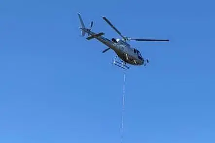 L'elicottero nella zona Case Bianche (foto L'Unione Sarda - Pala)