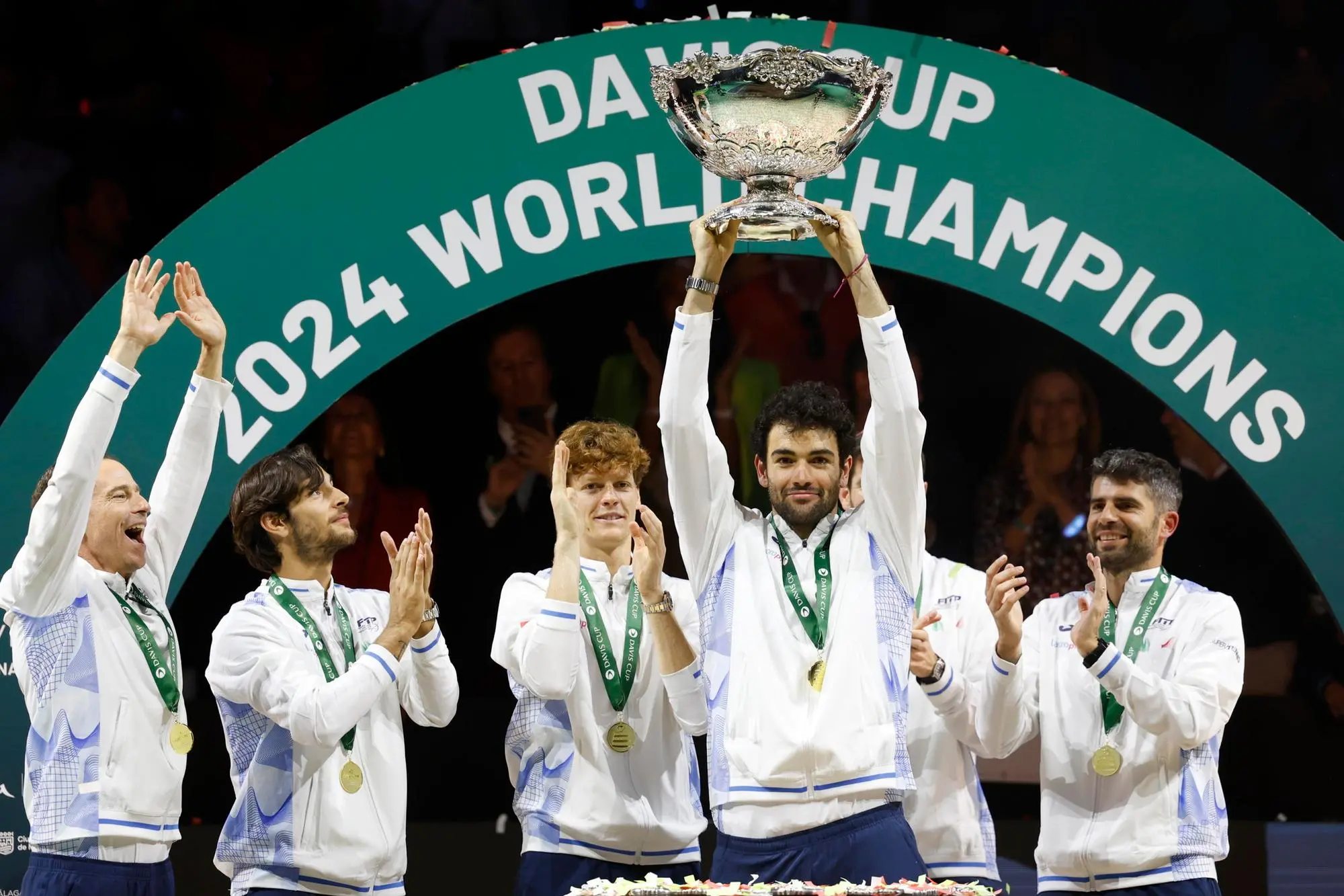 epa11738883 Italian Davis Cup tennis team celebrates winning the Davis Cup Final at Jose Maria Martin Carpena Pavilion, in Malaga, southern Spain, 24 November 2024. EPA/Jorge Zapata