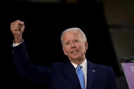 US Democratic presidential candidate Joe Biden answers questions after speaking about the coronavirus pandemic and the economy on June 30, 2020, in Wilmington, Delaware. (Photo by Brendan Smialowski / AFP)